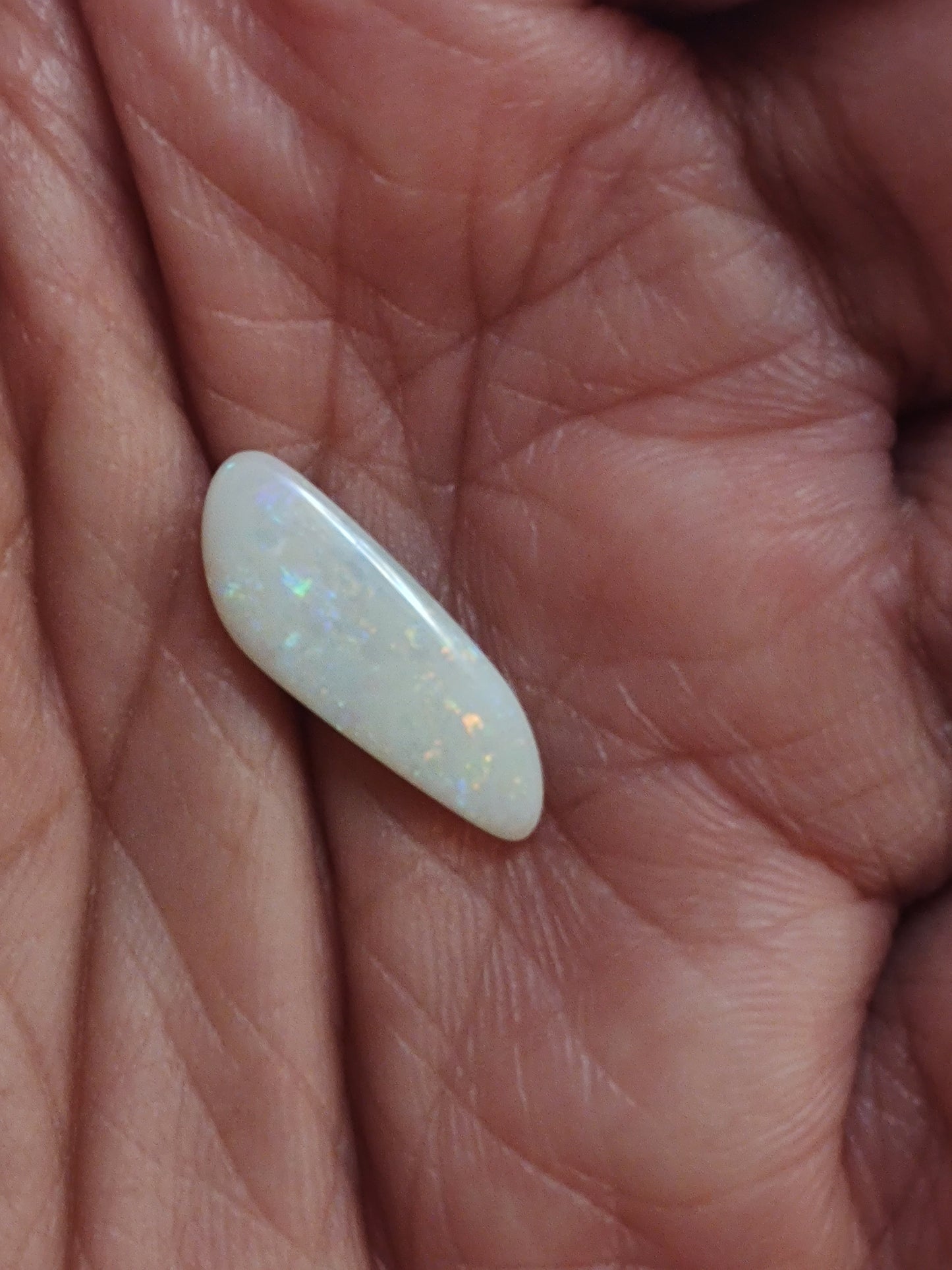 White Crystal Opal in a long freeform shape